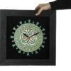 Islamische Wanduhr mit Holzeinlage des Propheten Muhammad