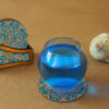 Set aus Untersetzern & Halter mit persisch inspiriertem Mandala-Design Sama