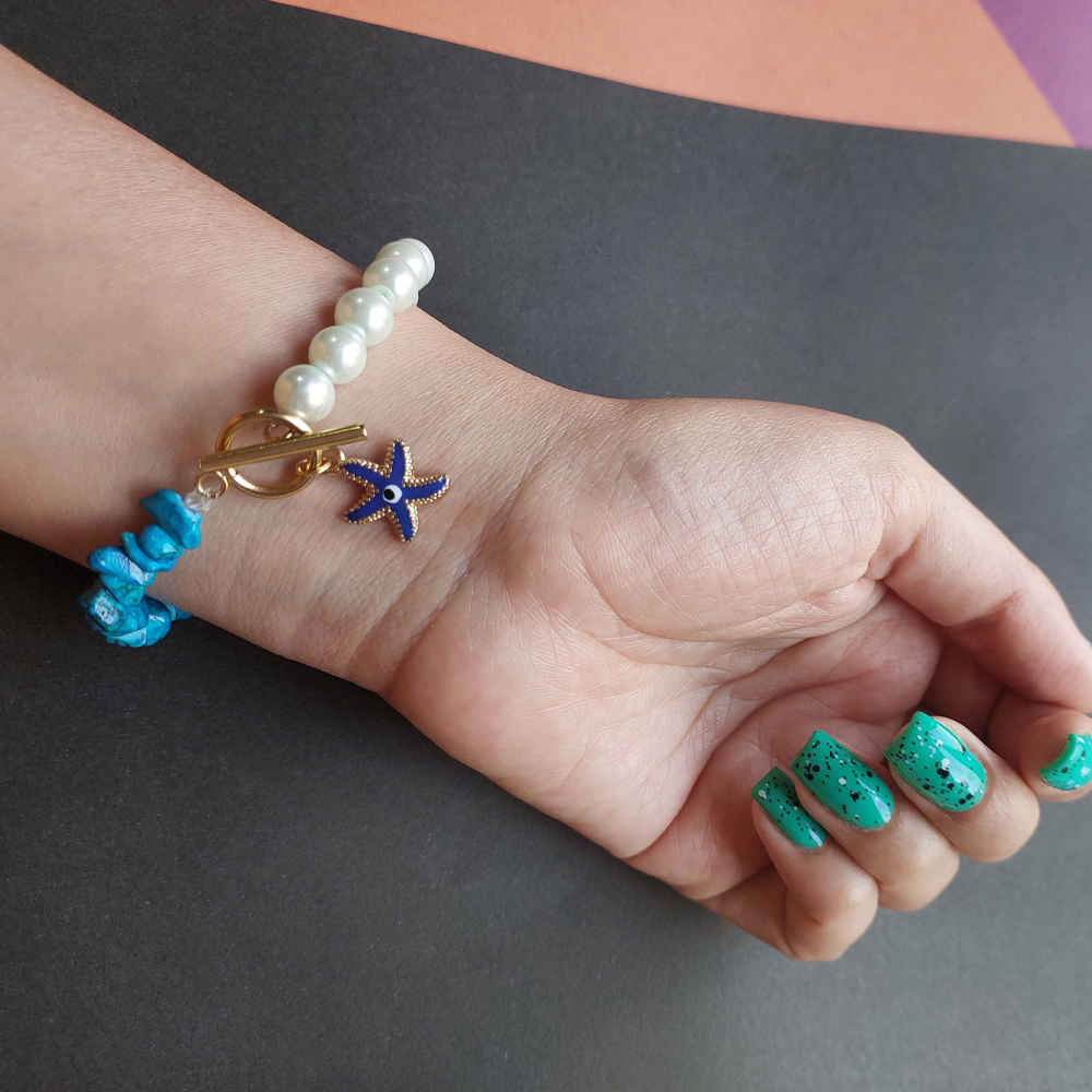 Perlenarmband für Damen – Böses Auge Koralle