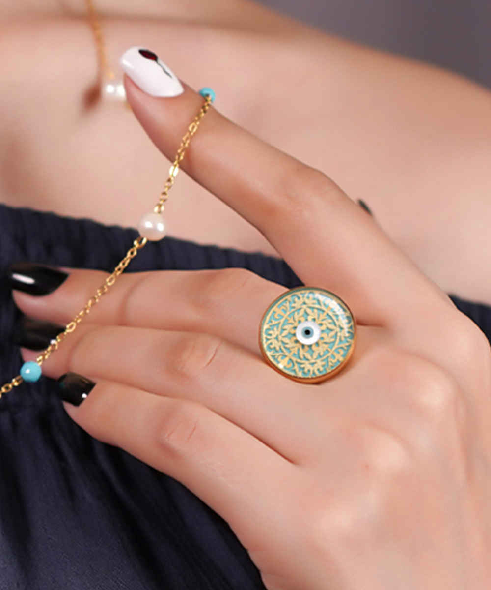 Stahl Siegelring mit Türkis Resinüberzug und vergoldet Auge des Bösen Symbol