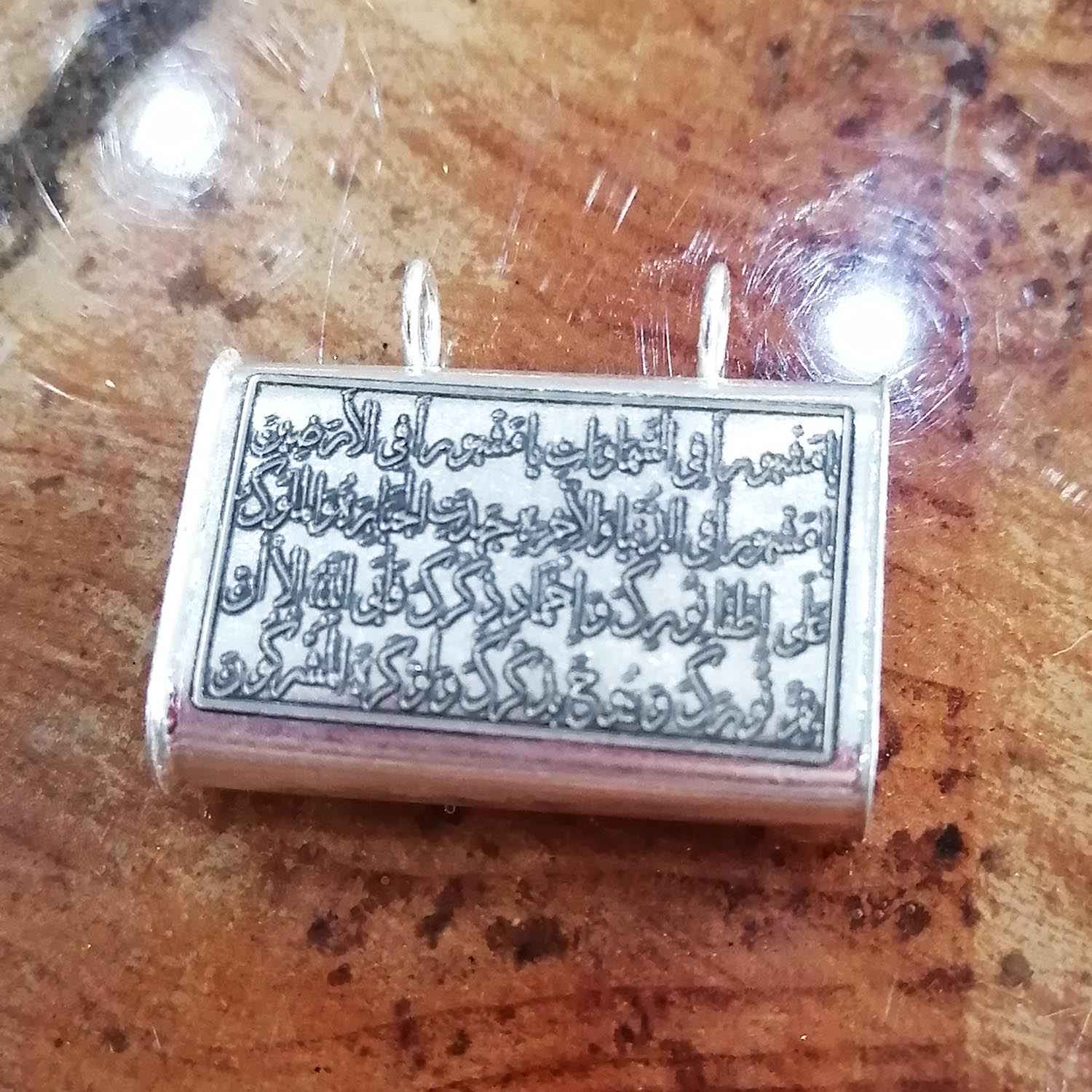 Islamisches Silberanhänger mit Hirz von Imam Jawad Religöse Symbolik