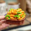 Orange Karotten im Korb Zahnstochersetzer
