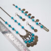 Schmuckset mit Türkisen und Münzen