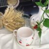 Künstlerische Keramiktasse - Handgefertigt mit Kirsch-Design