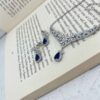 Elegantes Stahl-Schmuckset für Damen mit Blumenmuster