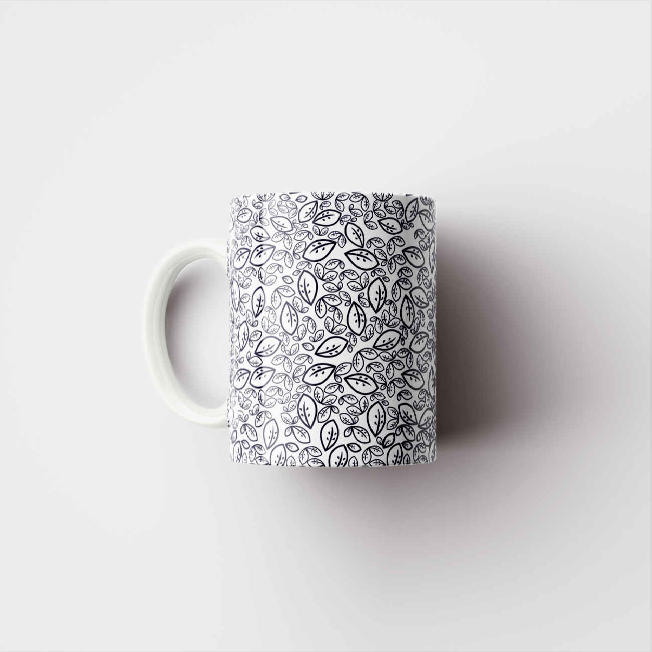 Keramik-Kaffeetasse mit Blättermotiv