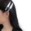 Leuchtende Haarspangen im Messer-Design Set aus 2
