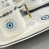 Künstlerisches Porzellan-Teeset mit weißem Schutz-Augen-Motiv – Schönes und symbolträchtiges Geschirr
