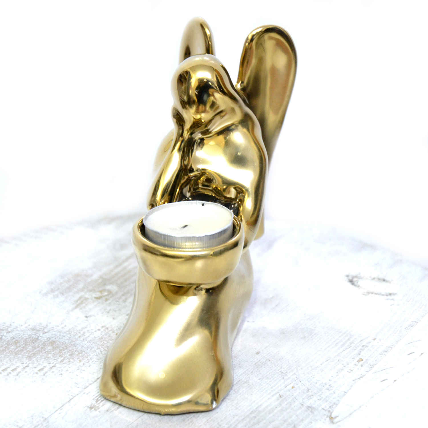 Dekorativer Kerzenhalter aus Keramik im schicken Engel-Design in Gold