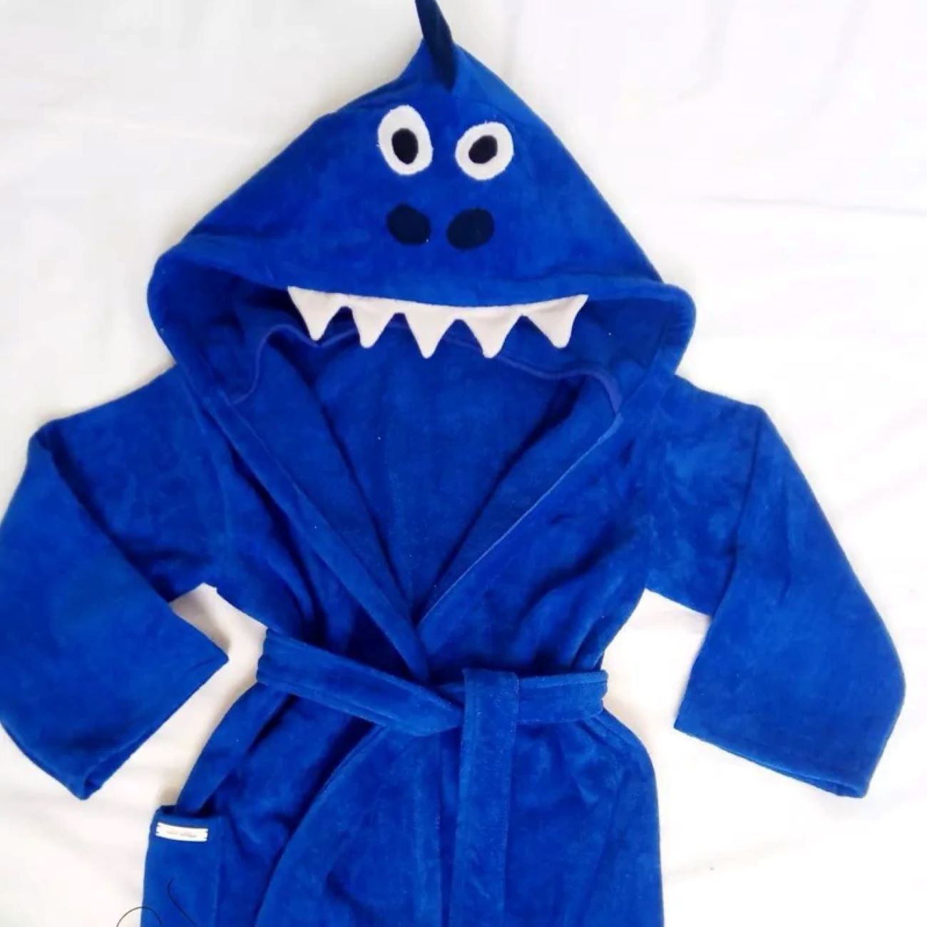 Hellblaue Badeponcho mit Kapuze und Dinosaurier-Design – Weiches Frottiertuch für Babys