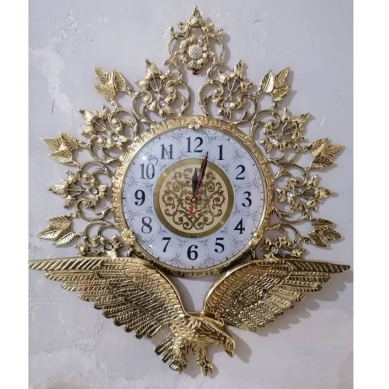 Exquisite Messing-Wanduhr mit Adler- und Blumenmotiv